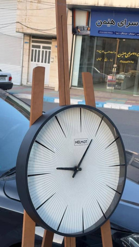 ساعت دیواری برند هلموت جنس فرم فلز قطر ۶۰ متور وارداتی بدونه صدا با ۵ سال گارانتی معتبر